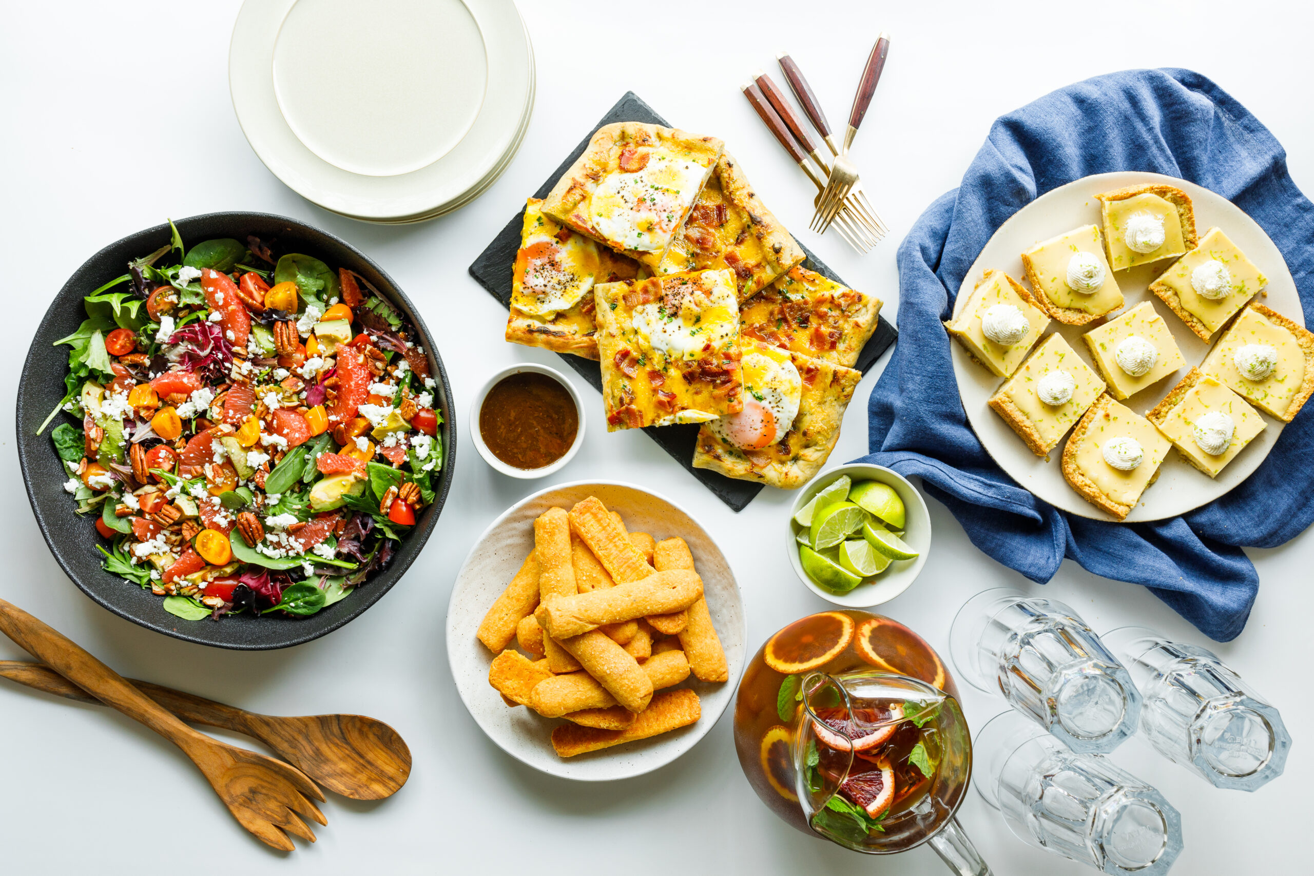 a spread of appetizers and snacks that could be used for a book club