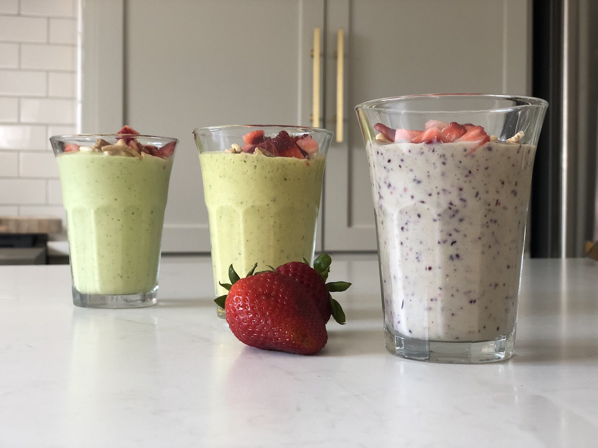 The three One-Minute, Healthy Smoothie Recipes on a countertop