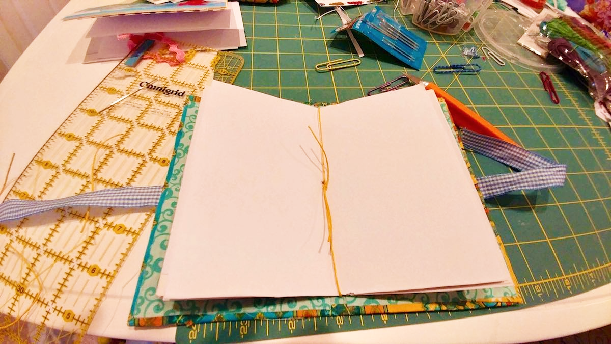 Sewing in the pages into the binding