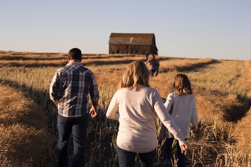 Fall Routines - A family running through a field