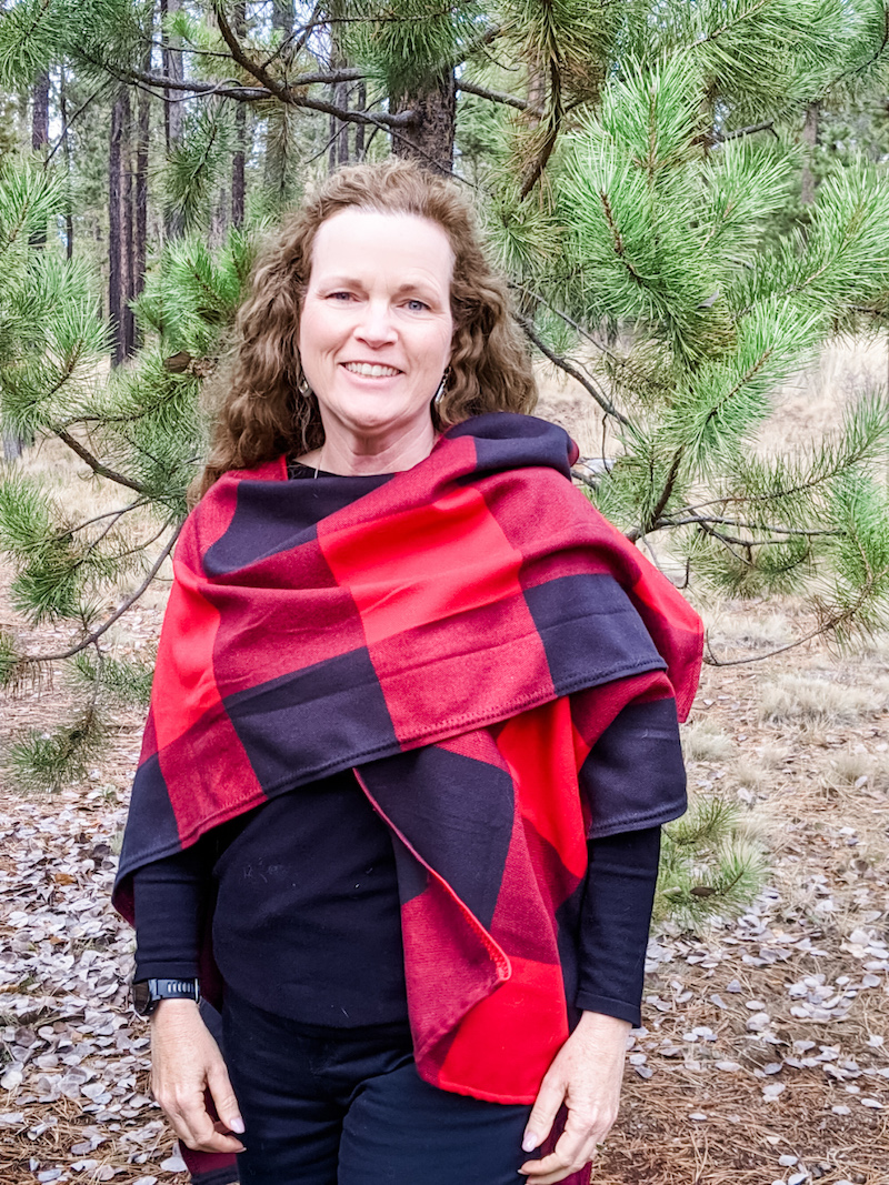 Marie wearing a finished, red plaid DIY Ruana.