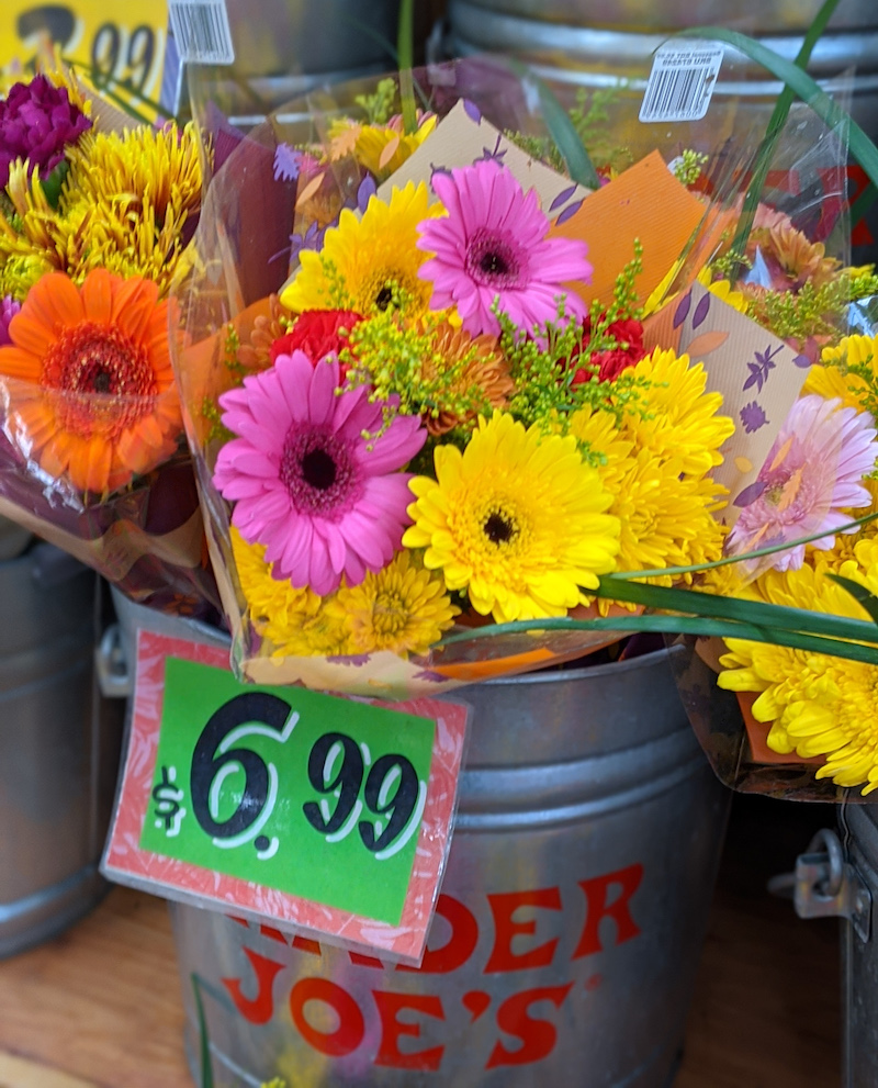 Bouquets of flowers in a metal bucket