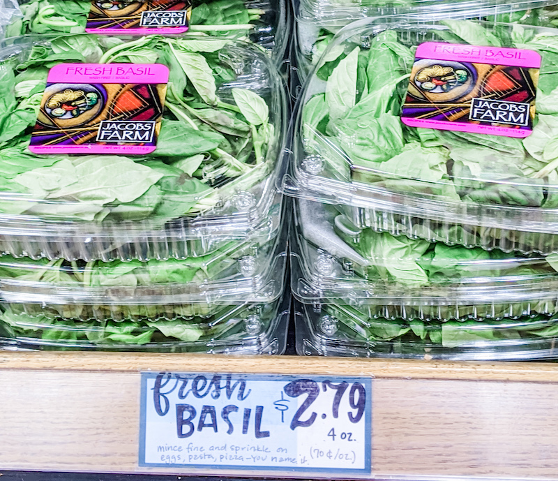 Packages of fresh basil