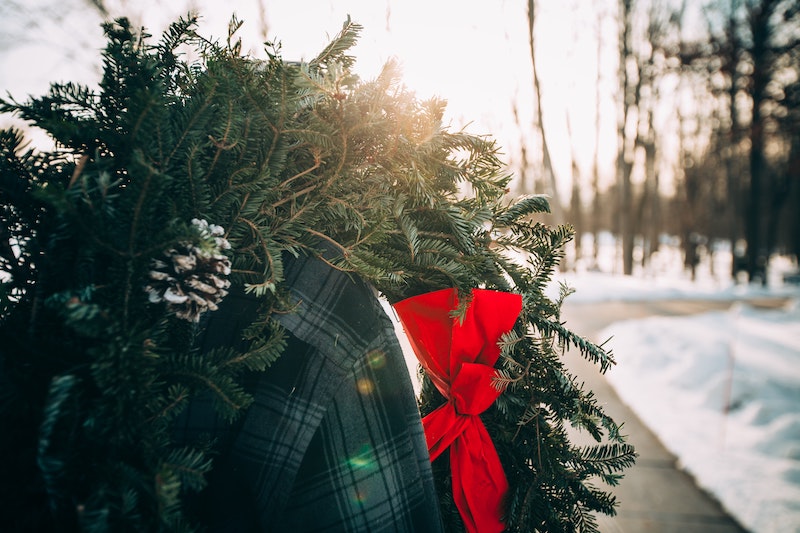 A Large Christmas wreath with a red bow.