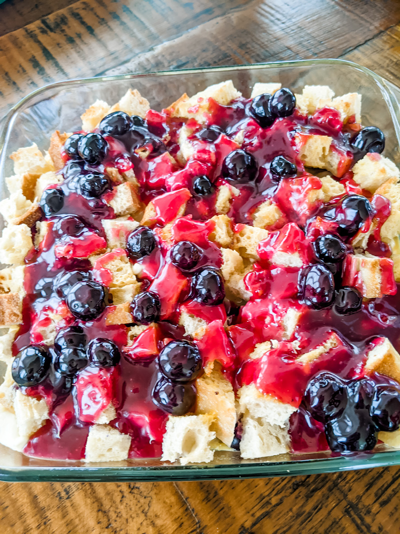 The prepared Easy Blueberry Lemon Breakfast Casserole ready to go into the oven.