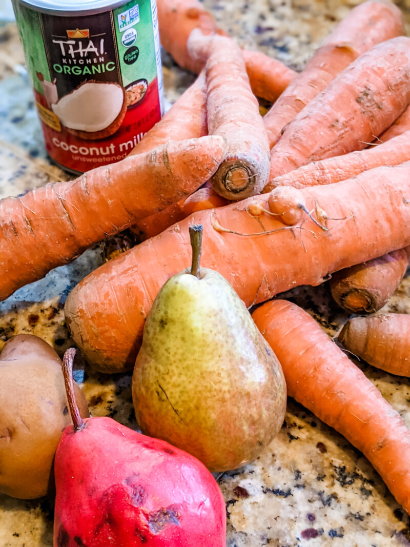 The main ingredients for the Carrot Pear Soup - coconut milk, pears, and carrots.