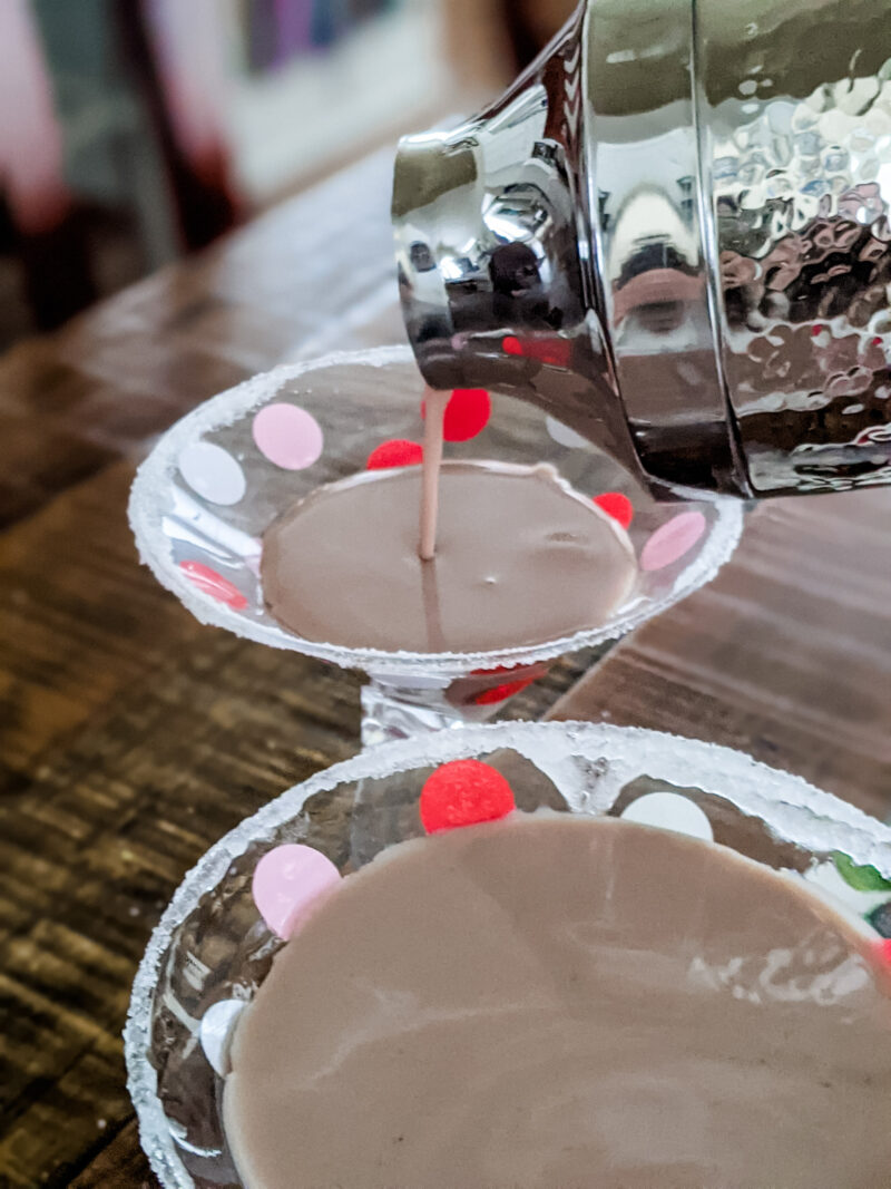 Pouring the Chocolate Martini Cocktail into two glasses