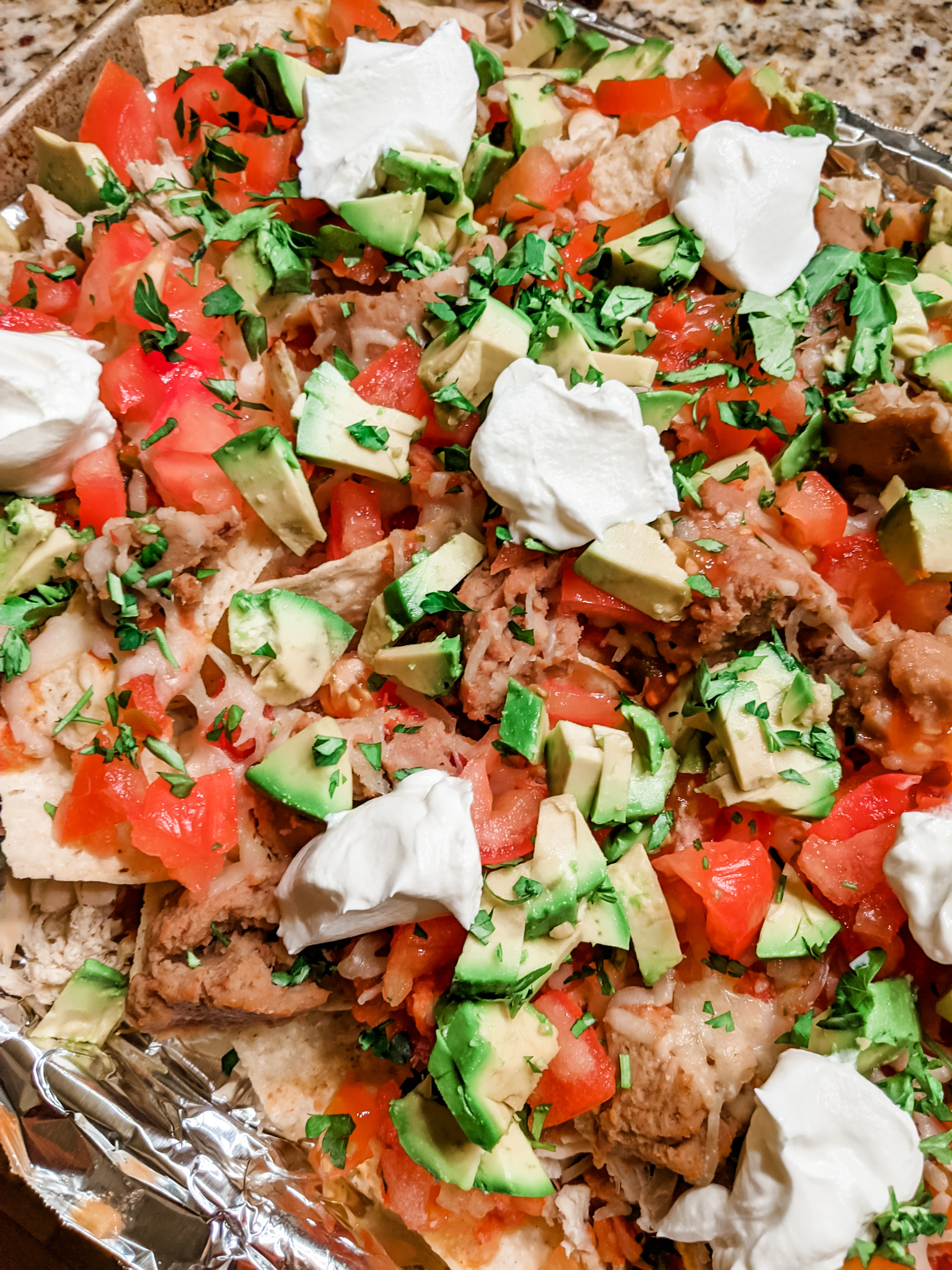 A tray full of the chicken nachos.