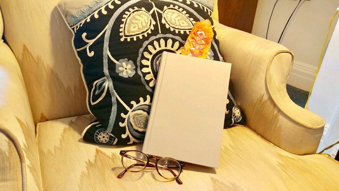 A Valentine craft - a bookmark in a book, placed on a chair