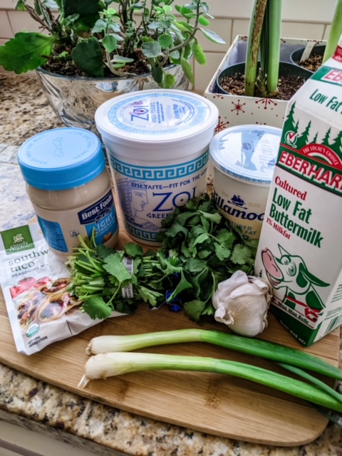 The ingredients for the Lighter Southwestern Buttermilk Ranch on a cutting board.
