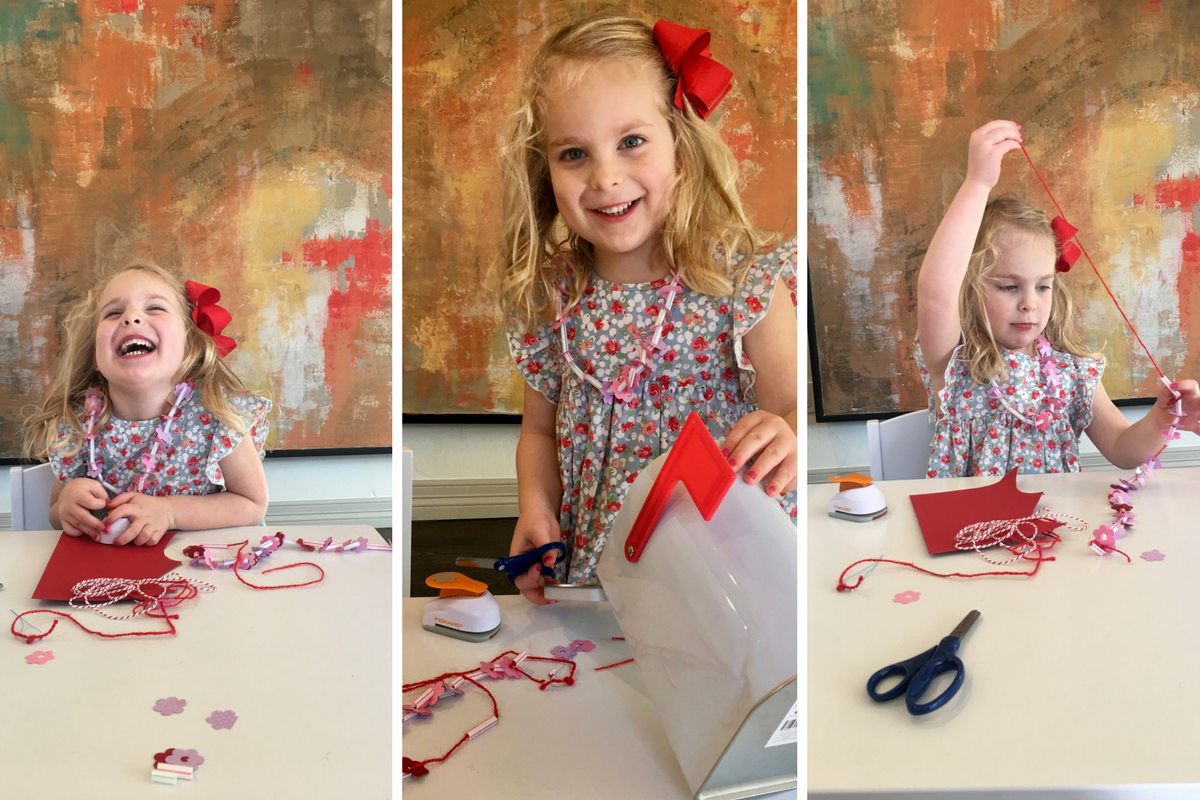 A happy girl in a sequence of photos where she is crafting. 