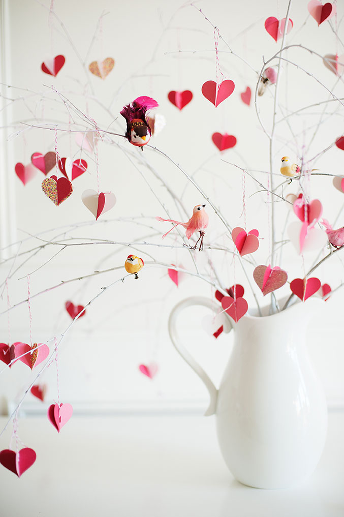 Branches decorated with hearts and birds emerging from a vase - a valentine craft