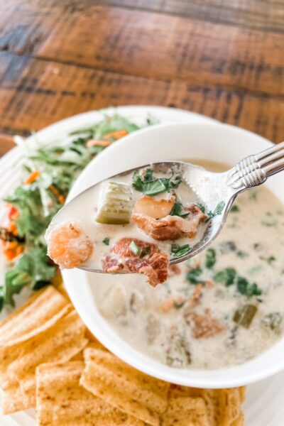 A bowl of the Quick and Creamy Seafood Chowder with a spoon