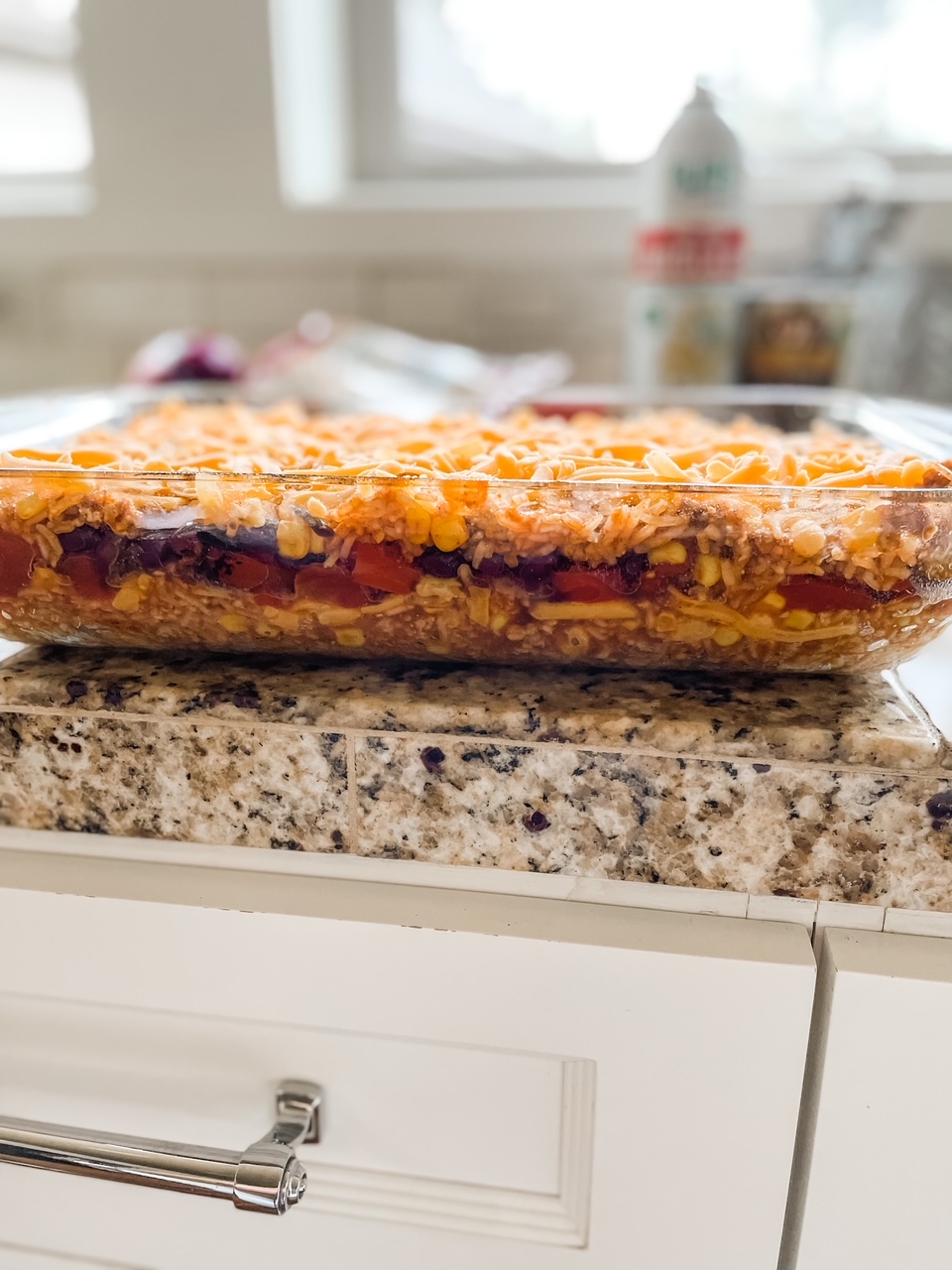 Marie's Mexican Chicken Casserole that looks similar to a 7-layer dip
