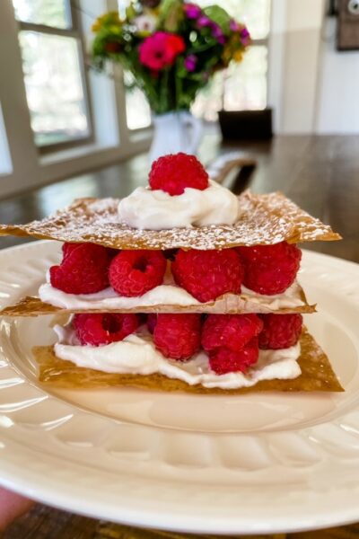 The finished Raspberry Napoleons on a white plate