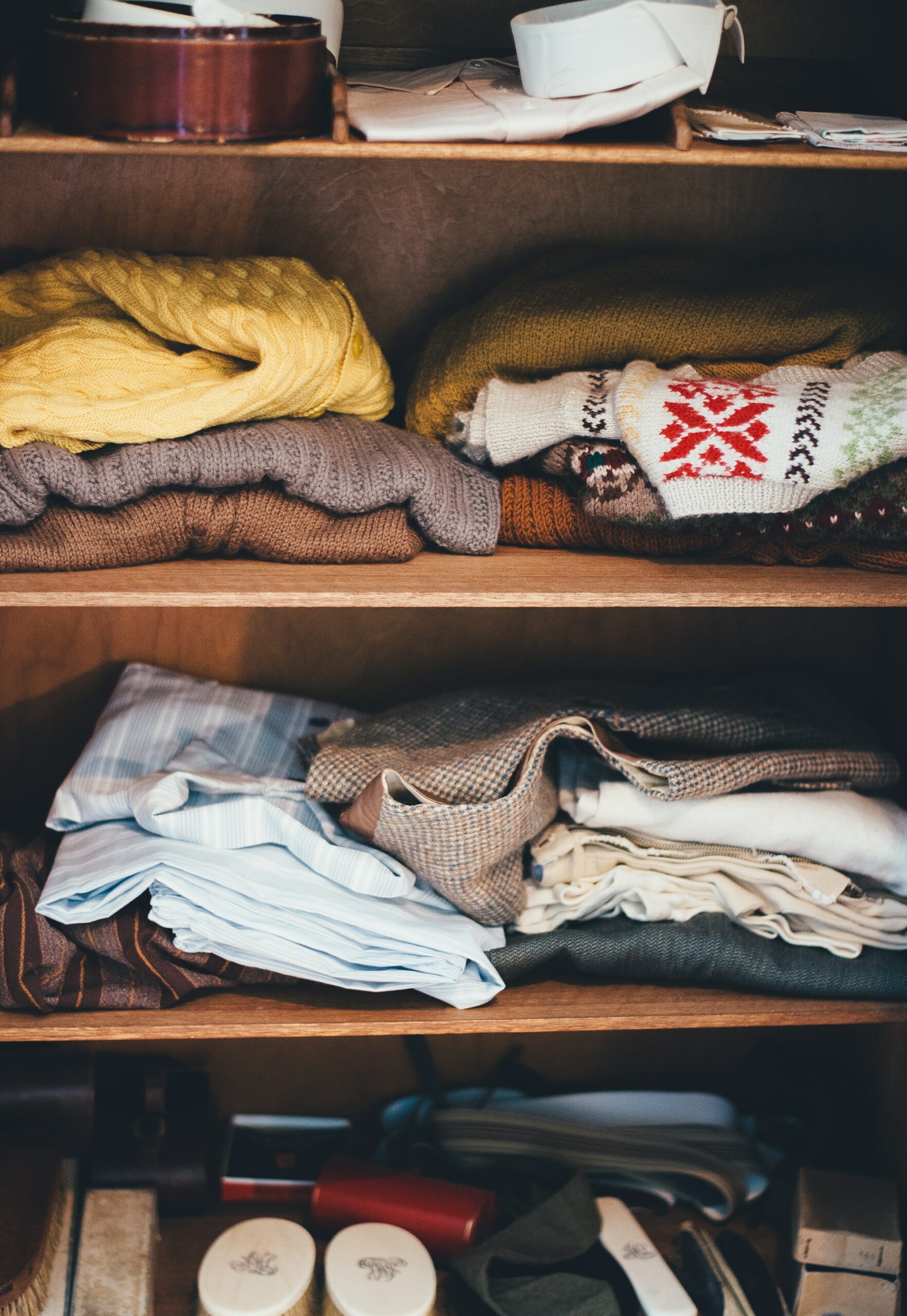 Work on one space at a time, such as this disorganized closet - a 10 Downsizing Tips and Truths