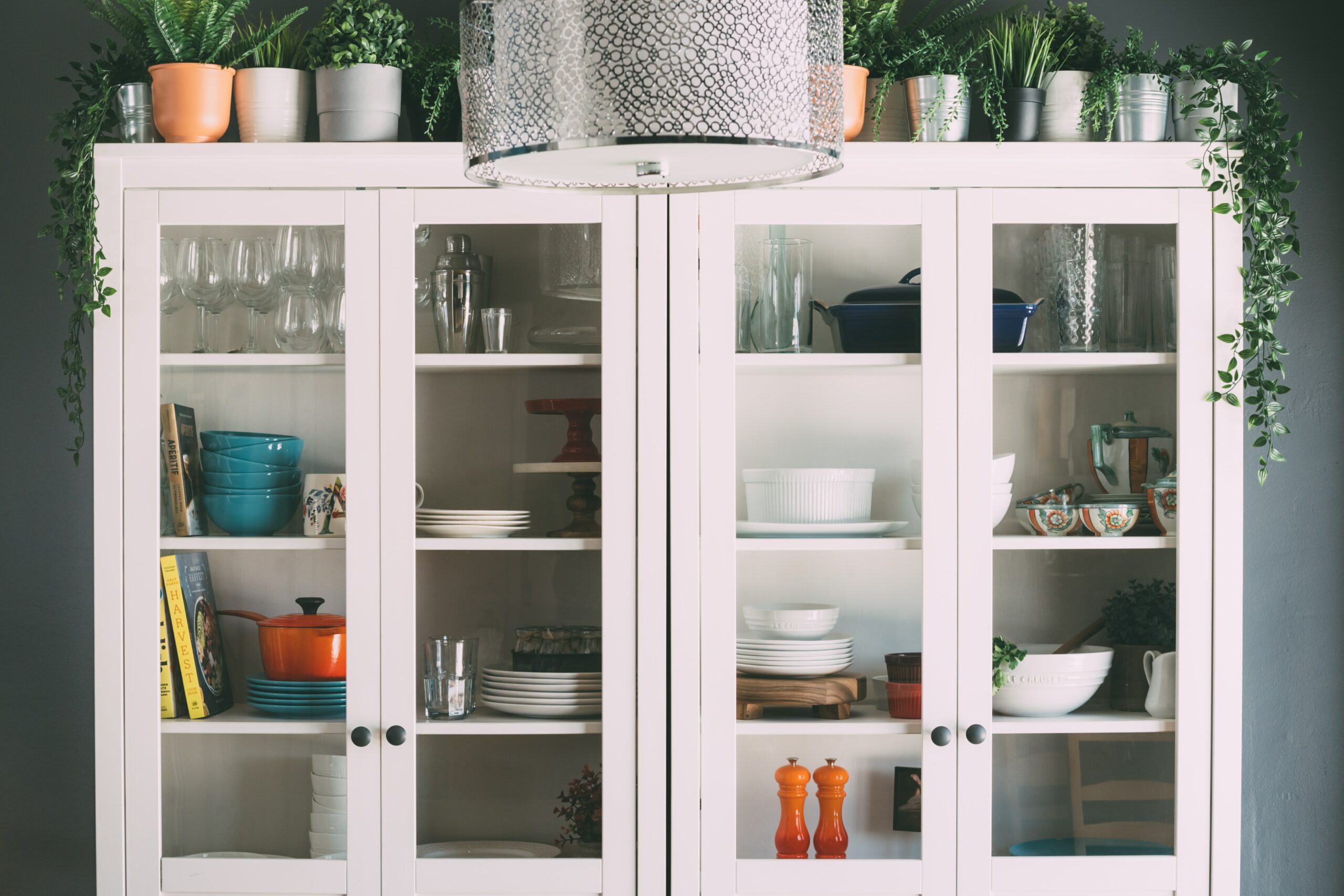 A cabinet full of dishware