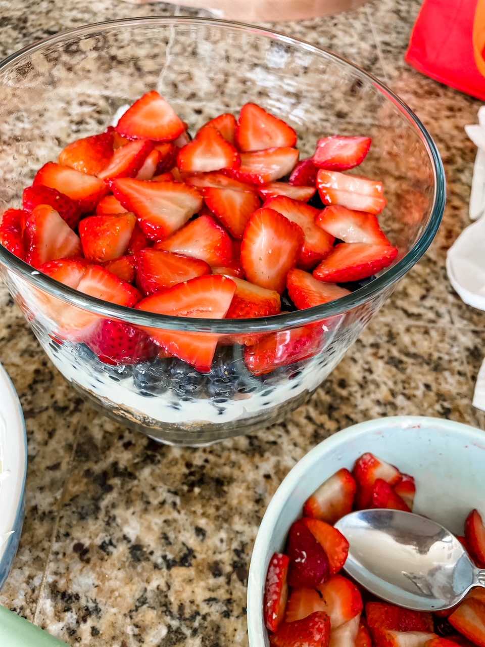 One layer of the filling, blueberries, and strawberries for the Lighter Berry Trifle with Lemon Filling