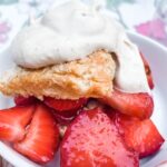 The Homemade Shortcake Biscuits topped with strawberries and whipped cream