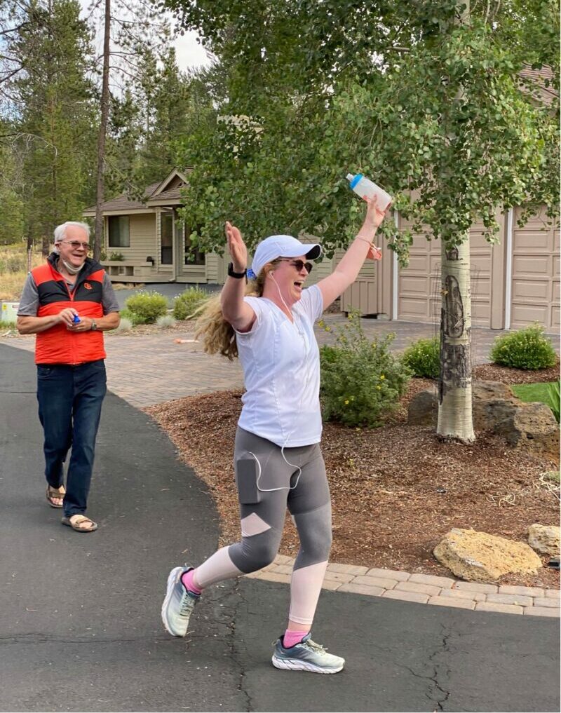 Marie crossing the finish line