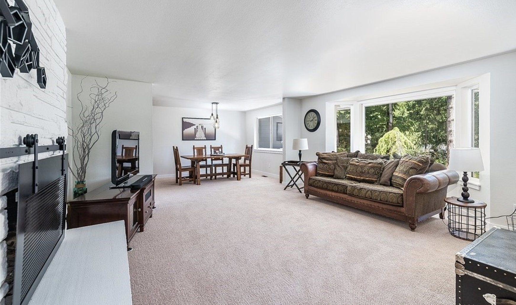 One of the Remodeling Before and After - the before of the wooden gray floors that Marie replaced