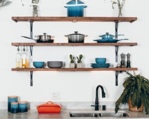 A wall full of kitchen tools and dishware