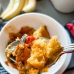 A bowl with a sering of the Easy Slow Cooker Tamale Pie