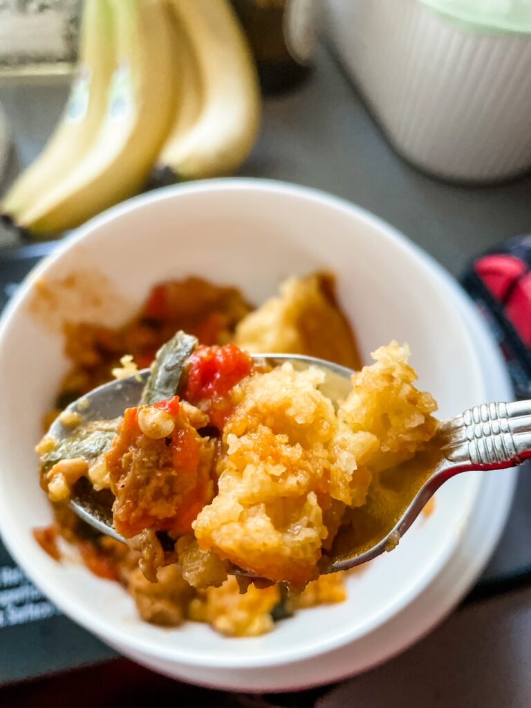 A bowl with a sering of the Easy Slow Cooker Tamale Pie