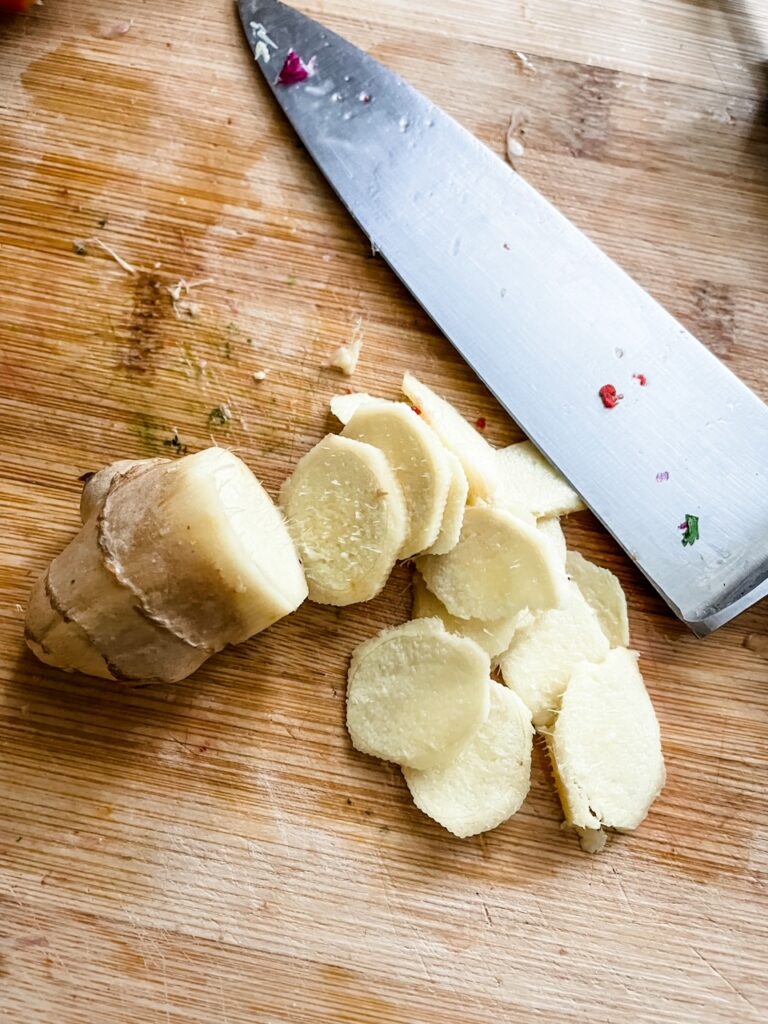 The ginger for the Slow Cooker Ginger Peach Chicken chopped into coins