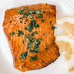 A close of up of the Easy Pan Seared Steelhead Trout with Lemon Butter Sauce with seasonings