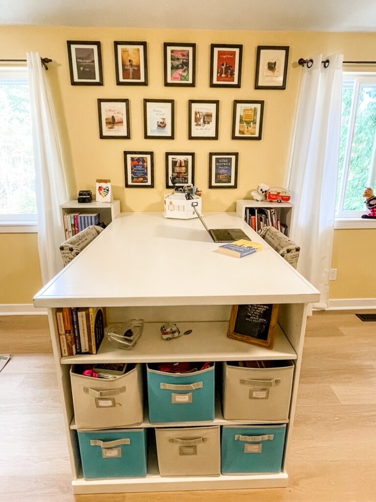 A DIY Storage Solutions - an island that is used as a writing and sewing table