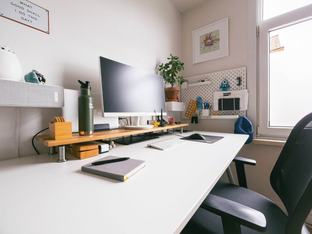 An office with a hanging pegboard - an easy DIY storage solution