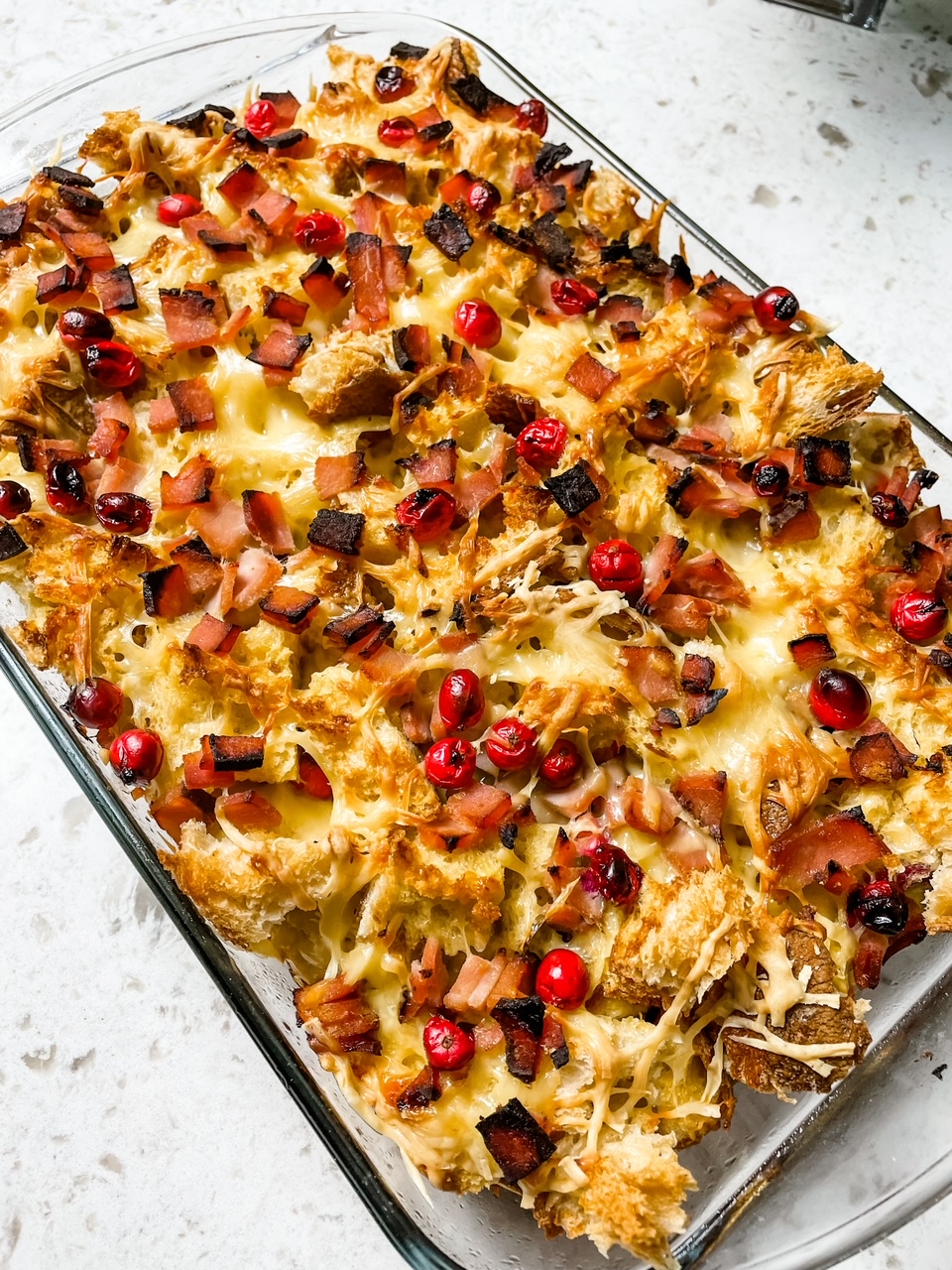 The finished Cranberry, Ham and Swiss Cheese Breakfast Casserole in its baking dish