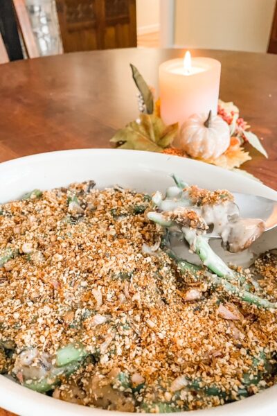 A spoon scooping up some of the Easy Healthier Green Bean Casserole
