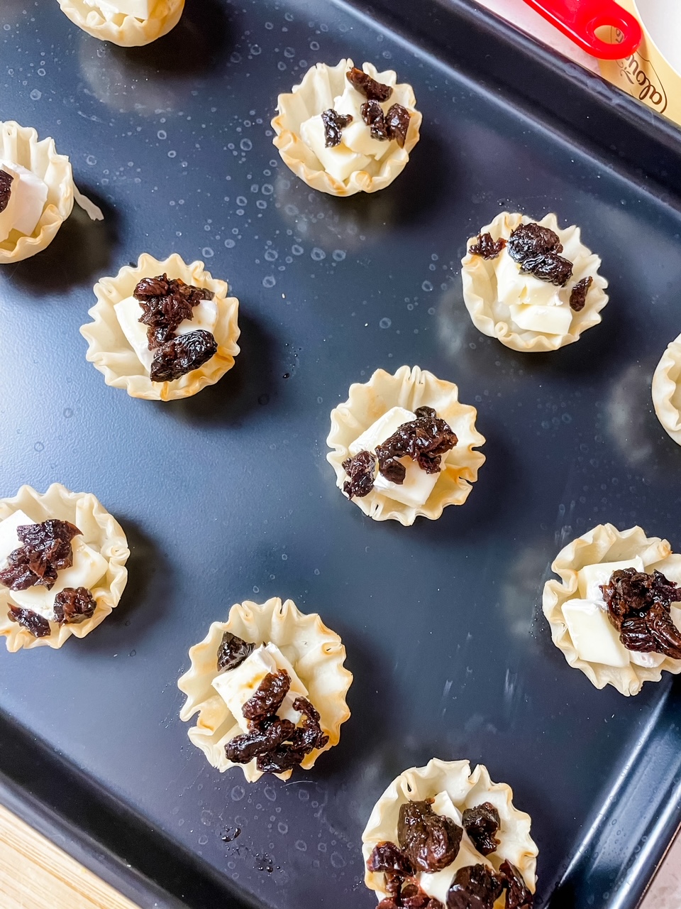 The tarts with the brie and dried cherries