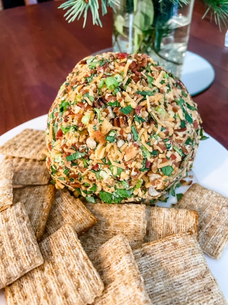 Best Holiday Cheese Ball with crackers, a classic for the New Years Eve Appetizer Round Up
