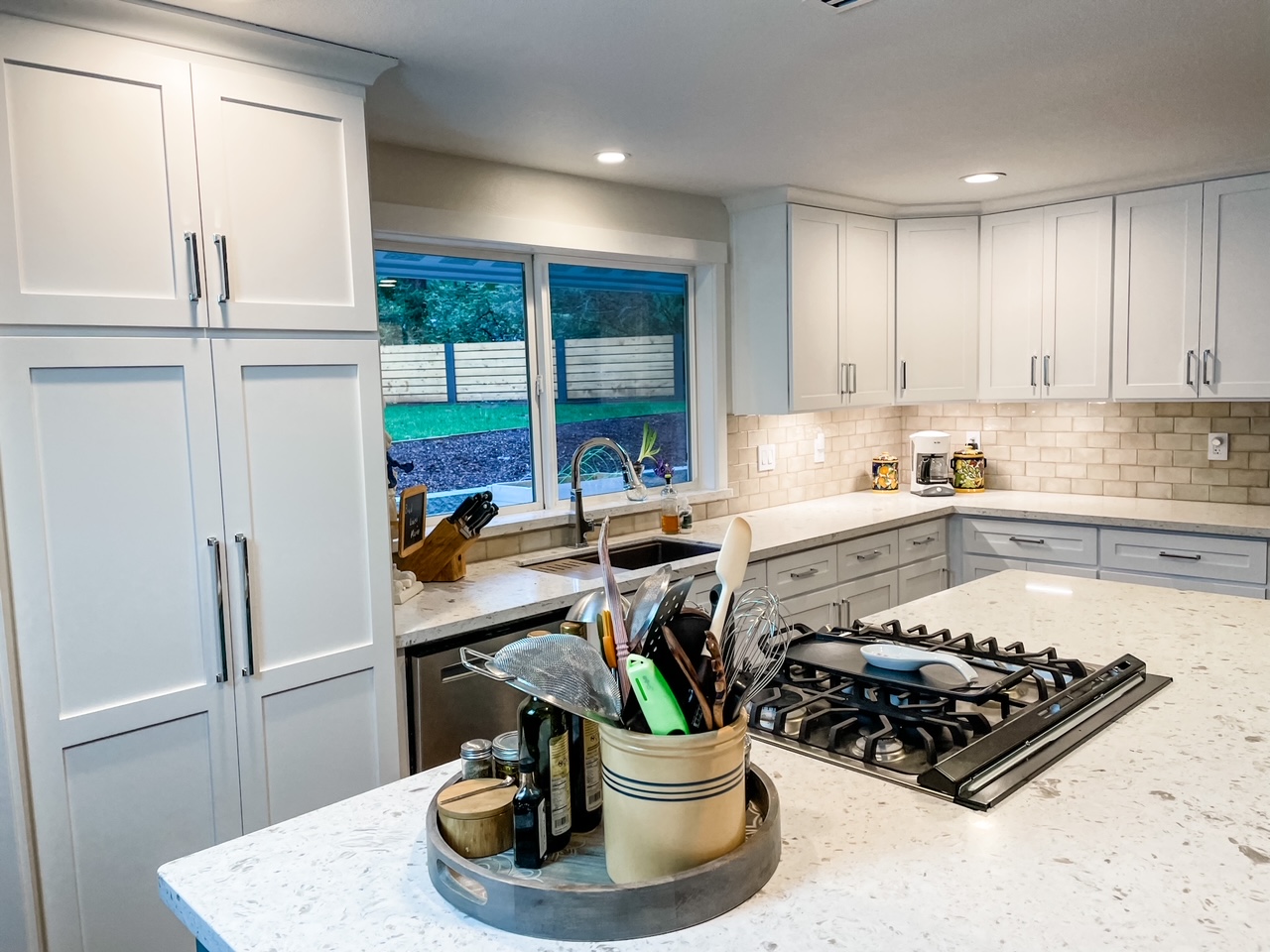 The new kitchen island placed near the stove and dishwasher