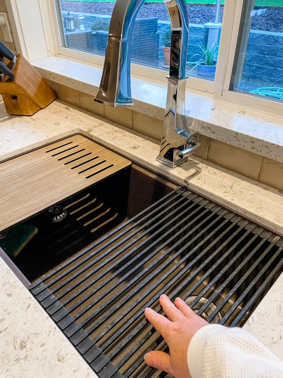 The new kitchen sink workstation, a large part of the kitchen remodel