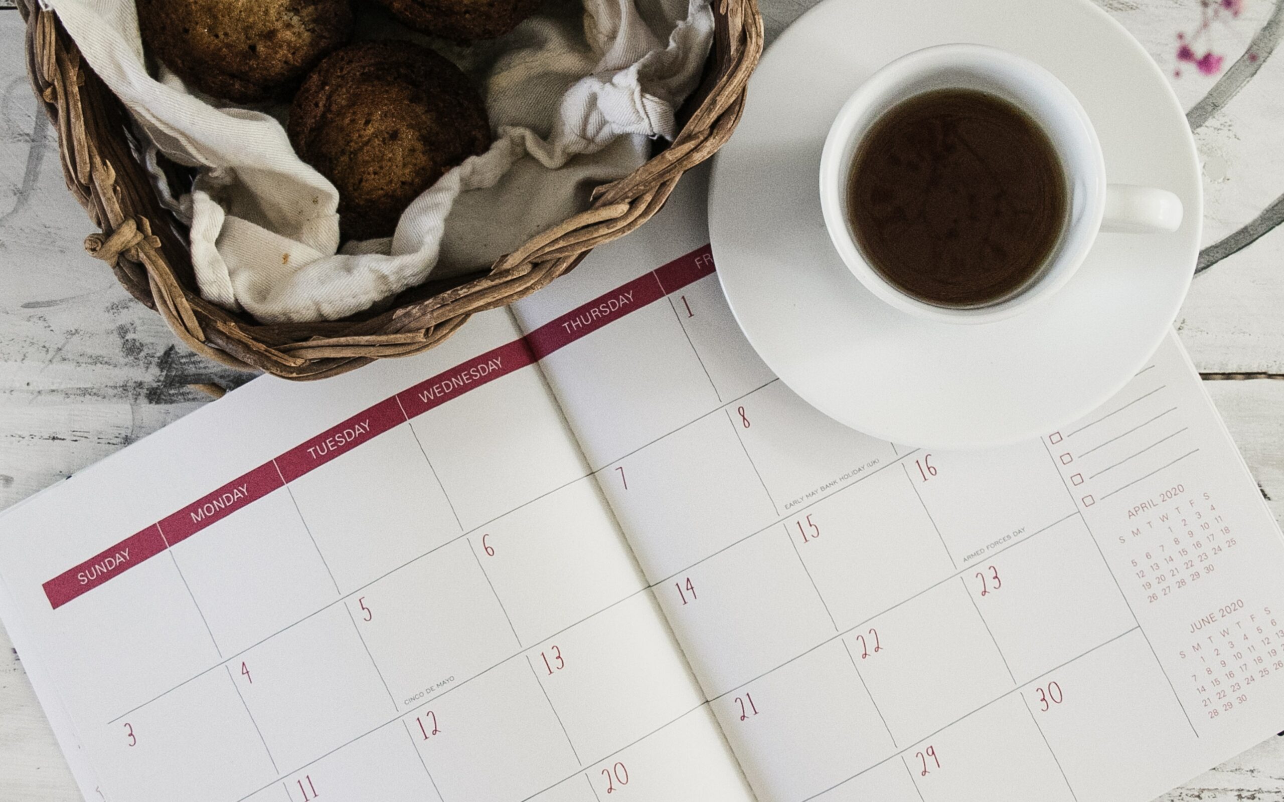 A calendar with a cup of tea next to it - Self-Care for Caregivers