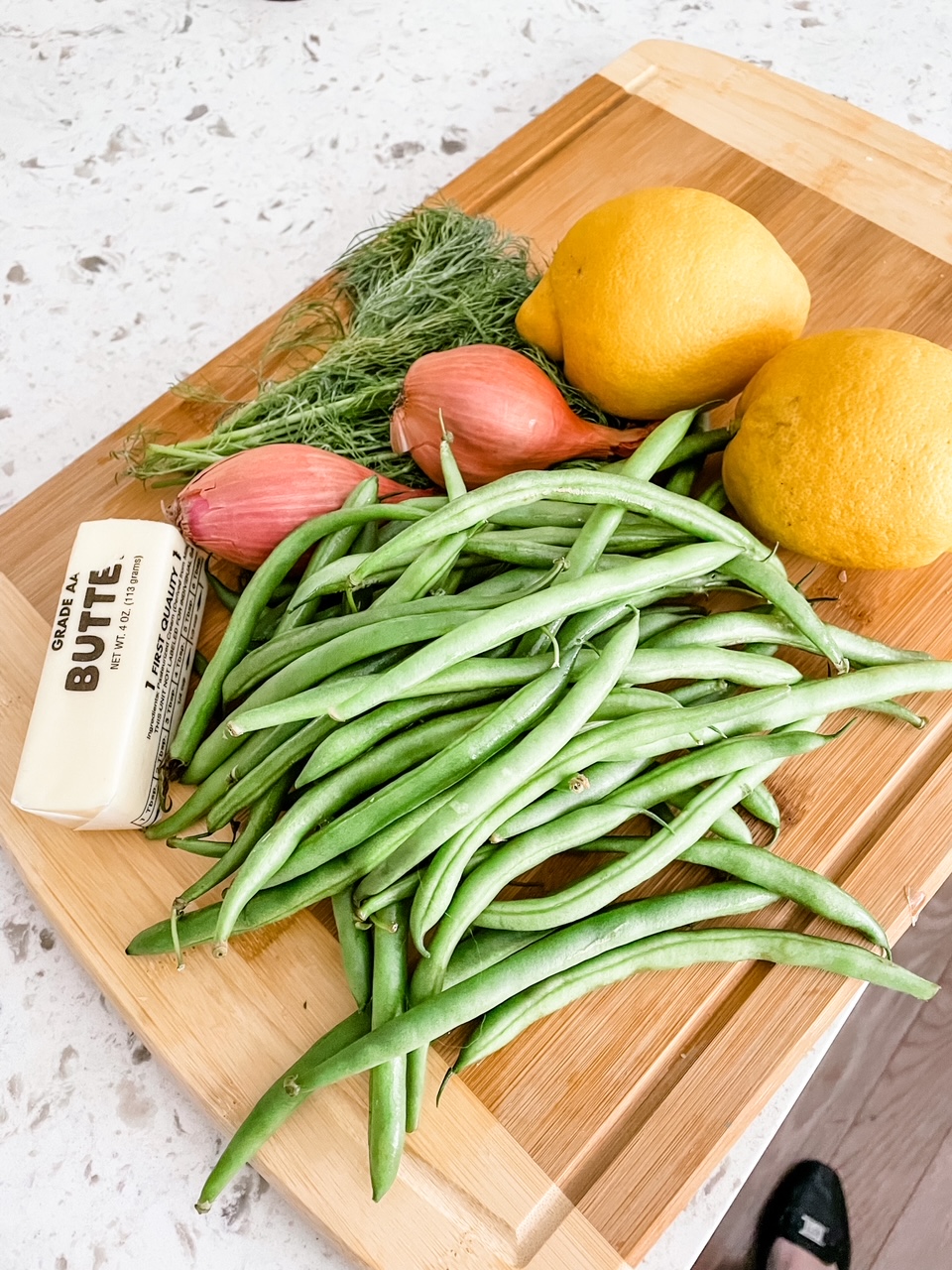 The ingredients for the Green Beans with Dill and Lemon: green beans, butter, shallot, dill, and lemon