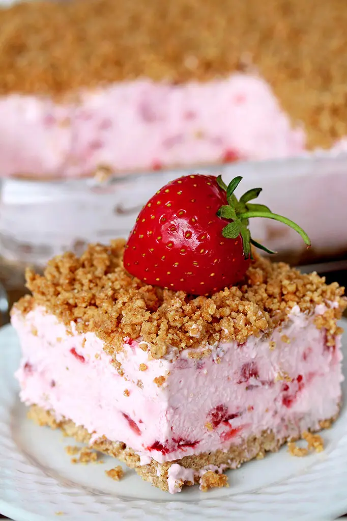 A plated slice of the frozen strawberry dessert - a frozen one of the unique strawberry recipes