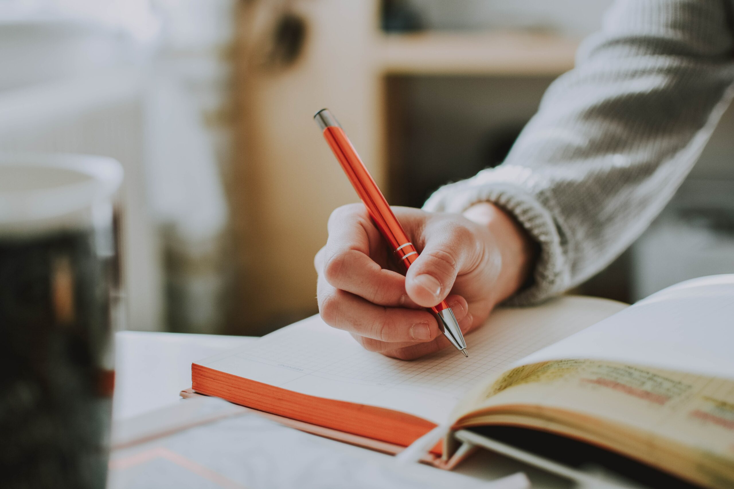 A woman writing in a journal