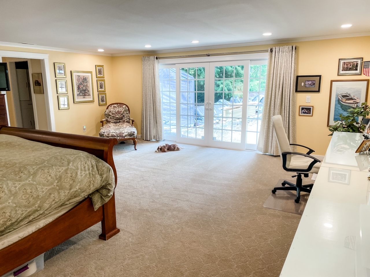 A view of the workspace within the garage converted into a bedroom