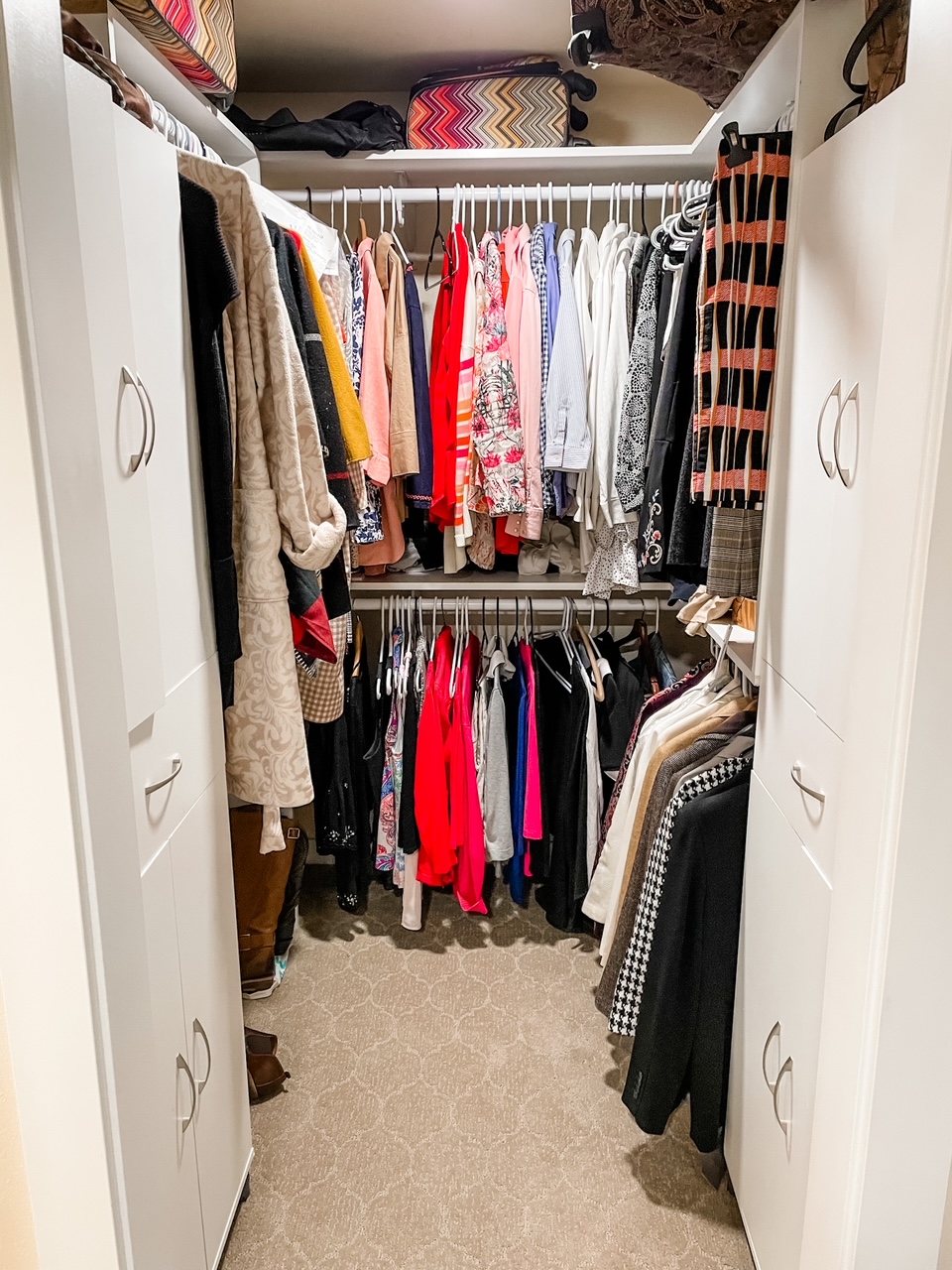 The other closet with more hanging space and cabinets