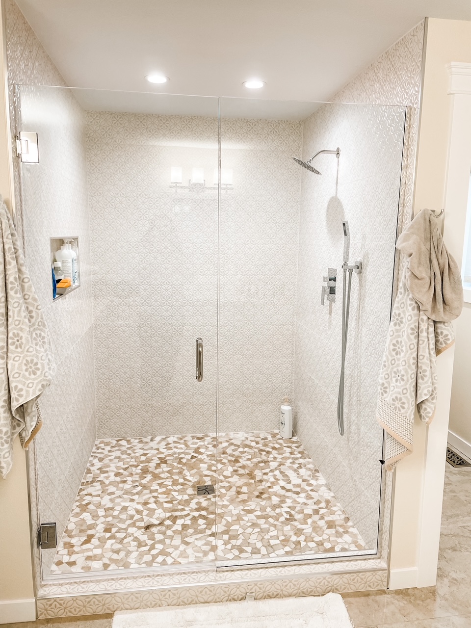 The whole view of the remodeled bathroom shower