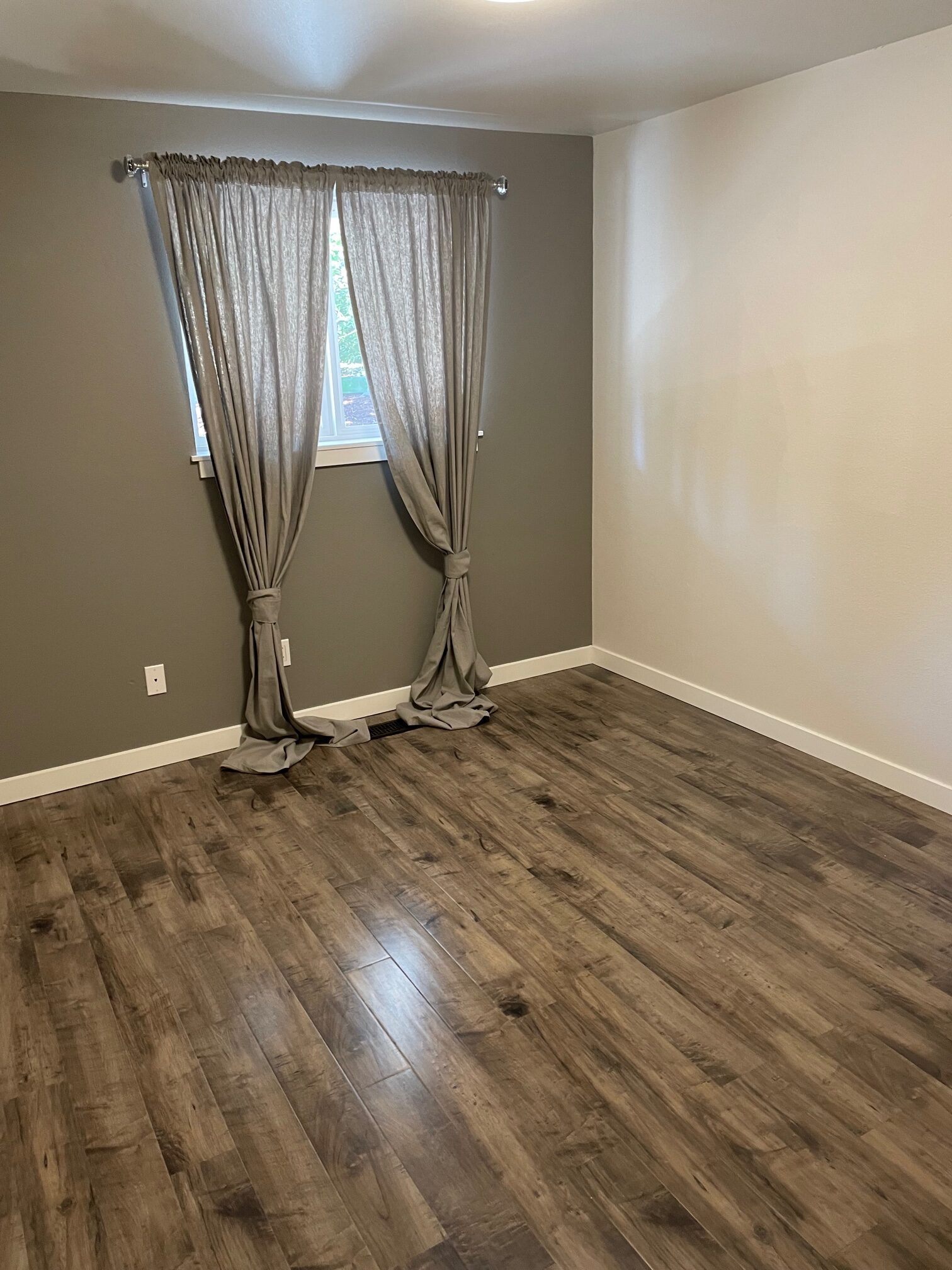 Another view of the bedroom 'before' of the Garage to Master Suite Remodel