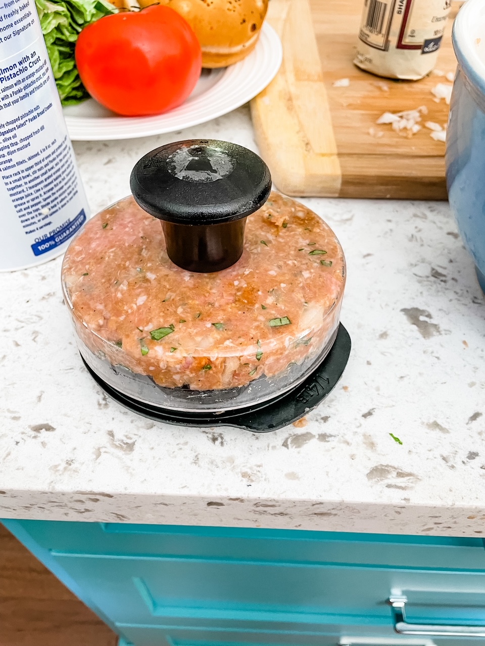 The turkey patty in the patty press