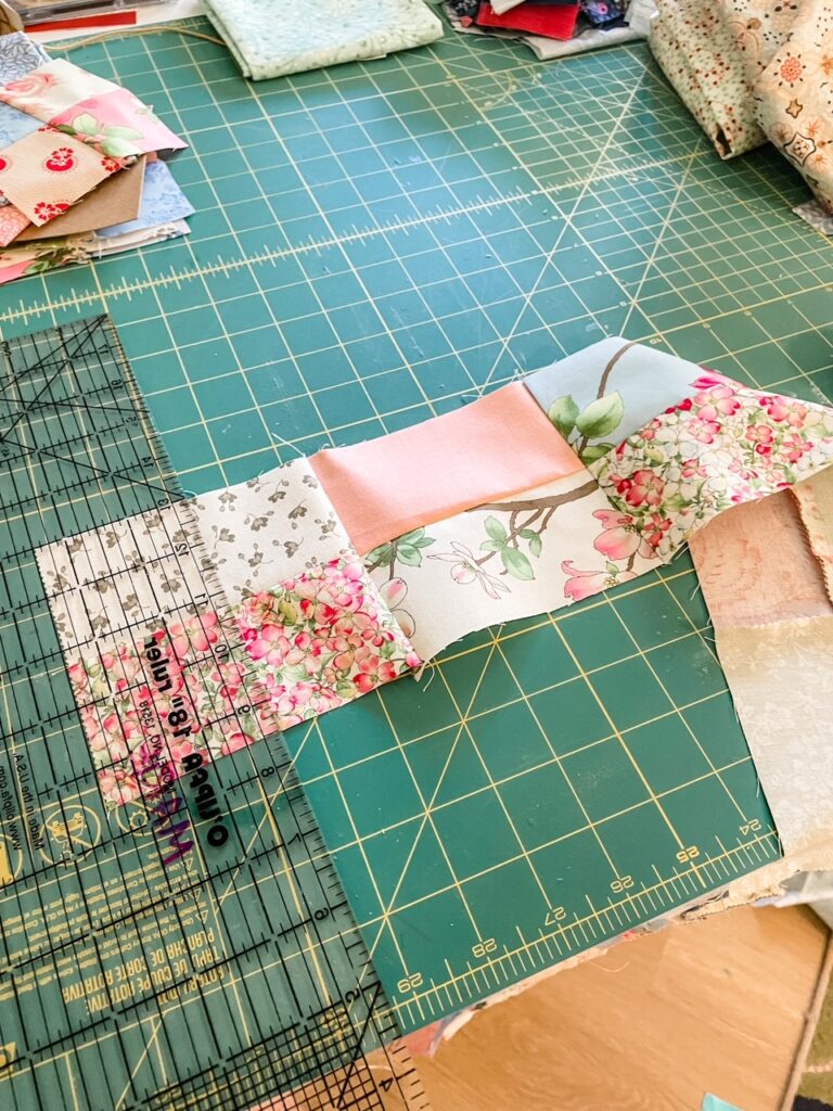 Cutting the long two-block pieces into four blocks