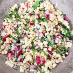 The finished Barefoot Contessa’s BEST Corn and Basil Salad served in a bowl