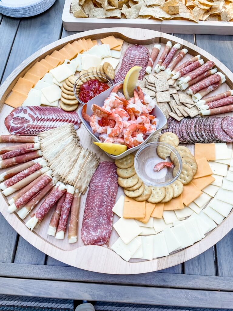 A platter of cheese and deli meats - a Easy Hosting Tips